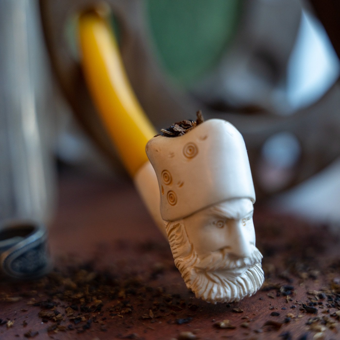 Carved pipe macro product photograph